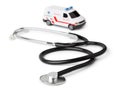 Stethoscope and toy ambulance car Royalty Free Stock Photo