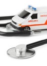 Stethoscope and toy ambulance car Royalty Free Stock Photo