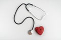 Stethoscope and two red hearts on white background. Health concept. Heart transplant