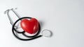 Stethoscope on white background with plush heart top view Royalty Free Stock Photo