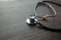 Stethoscope on wooden table background. medical health concept