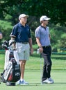 Steve Williams caddying for Adam Scott. Royalty Free Stock Photo