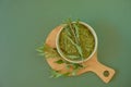 Stevia rebaudiana.Stevia plant.Alternative Low Calorie Vegetable Sweetener.Dried stevia and green twig in a cup on a Royalty Free Stock Photo