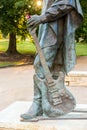 Stevie Ray Vaughan statue in front of downtown Austin and the Co