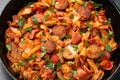 Stew cabbage with a sausage and bacon. Royalty Free Stock Photo