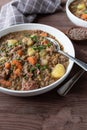 Stew with lentils, pork meat, potatoes and vegetables. Traditional german lentil soup Royalty Free Stock Photo