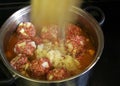 Stew meat cooking in pot