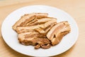 Stew pork slice and solidified fats from canned food