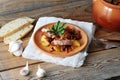 Stew - potatoes, beans, smoked in a clay pot Royalty Free Stock Photo