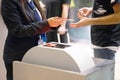 Stewardess checks the ticket and passport Royalty Free Stock Photo