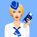 Stewardess with passport and air ticket in hand on blue background Royalty Free Stock Photo