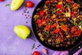 Stewed black beans with sweet peppers and tomatoes with spicy sauce