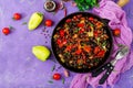 Stewed black beans with sweet peppers and tomatoes with spicy sauce