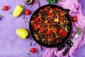 Stewed black beans with sweet peppers and tomatoes with spicy sauce