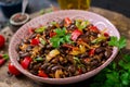 Stewed black beans with sweet peppers and tomatoes with spicy sauce