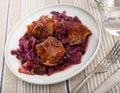 Stewed braised red cabbage with pork ribs. German food tradition