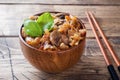 Stewed cabbage with mushrooms on the old wooden background in rustic style Royalty Free Stock Photo