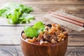 Stewed cabbage with mushrooms on the old wooden background in rustic style Copy space Royalty Free Stock Photo