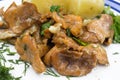 Stewed chanterelles in white sauce with boiled potatoes