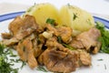 Stewed chanterelles in white sauce with boiled potatoes