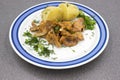 Stewed chanterelles in white sauce with boiled potatoes