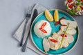 Stewed chicken breast in the oven with boiled white rice. Garnished with red chili peppers, green onion strips and lemon slices Royalty Free Stock Photo