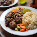 Stewed chicken with rice, beans and vegetables - Jamaican style on wooden table. vegetarian dish - rice with beans and vegetables