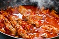 Stewed chicken in tomato sauce