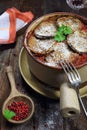 Stewed eggplant and wineglass