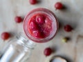 Stewed fruits with gooseberries in a glass jar from above Royalty Free Stock Photo