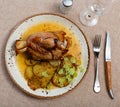 Stewed knuckle with potato served in a plate Royalty Free Stock Photo