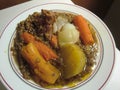 Stewed lentils with pumpkin, carrot, potato and pork meat