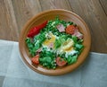 Stewed peas with poached eggs