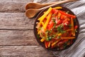 Stewed peppers with tomatoes and onions close up. horizontal top Royalty Free Stock Photo