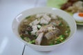 Stewed pork blood soup, pork bone broth Delicious Asian food in a white cup