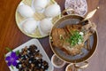 Stewed pork knuckle with gravy soup in Chinese Yunnan style or Yunnan pork leg stewed in gravy with Mantou, Chinese food Royalty Free Stock Photo