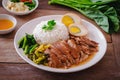 Stewed pork leg with boiled egg and rice on plate Royalty Free Stock Photo