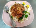 Stewed Pork Leg with Rice. Khao kha mu served with half spiced corned eggs, small pieces of pickled mustard greens Royalty Free Stock Photo