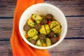 Stewed potatoes with meatballs in the crock-pot