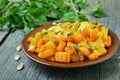 Stewed pumpkin on ceramic plate Royalty Free Stock Photo