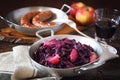 Stewed red cabbage with spices and apples. Garnish for fried sausages Royalty Free Stock Photo