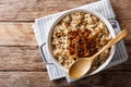 Stewed rice with lentils and fried onions close-up in a bowl. Ho Royalty Free Stock Photo