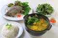 Stewed turtle softshells with herbs, banana soup and vermicelli