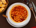 Stewed white beans with clams - traditional dish of spanish cuisine Royalty Free Stock Photo
