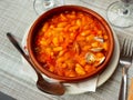 Stewed white beans with clams, spanish cuisine Royalty Free Stock Photo