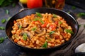 Stewed white beans with mushrooms and tomatoes