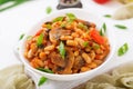 Stewed white beans with mushrooms and tomatoes