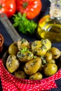 Stewed whole new baby potatoes with parsley sauce