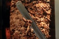 A stick of Arab shwarma in front of the grill Royalty Free Stock Photo