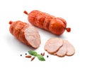 Stick of boiled pork sausage, sliced smoked ham, gammon with spices and fresh herbs isolated on white background Royalty Free Stock Photo